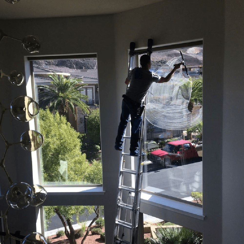 a man on a ladder on a ladder